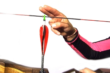 How tight should an arrow nock be?