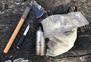 Bushcraft knife review Mora Garberg with haversackand canteen.
