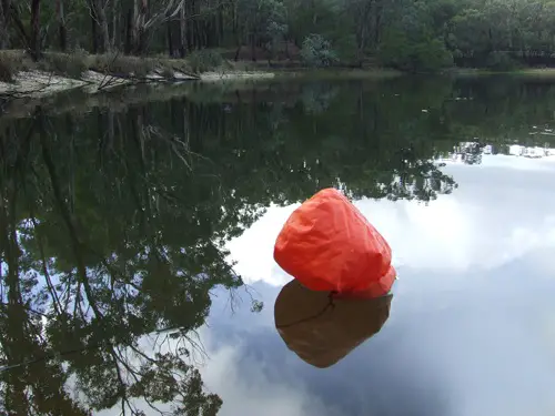 Dry bag uses for survival fishing. Using it for float for trotline.