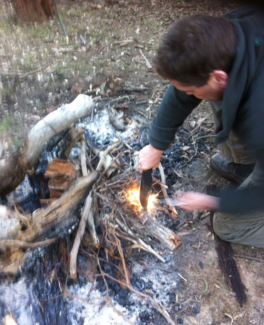 Ka-Bar Warthog firelighting campfire with ferro rod 