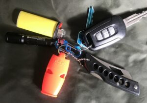 Keychain survival kit whistle