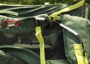 Ranger beads on backpack.