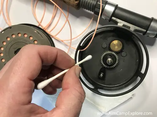 Cleaning fly fishing reel with Q-tip