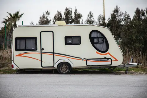 Travel trailer parked side of road